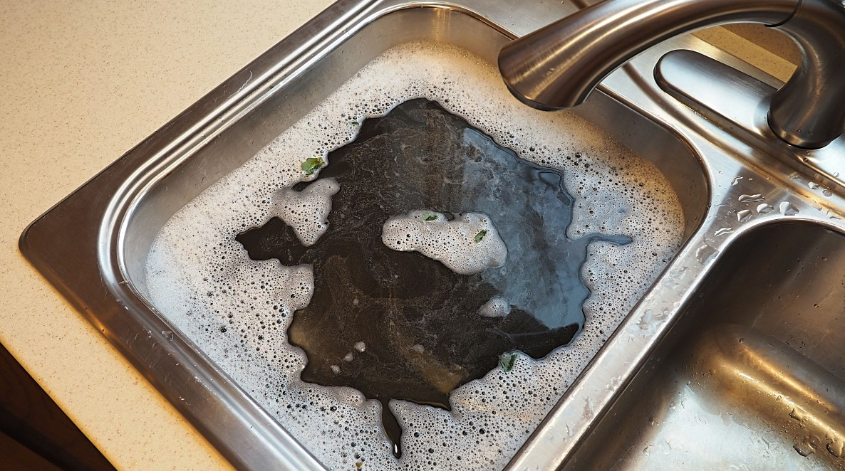 drain water clog sink full